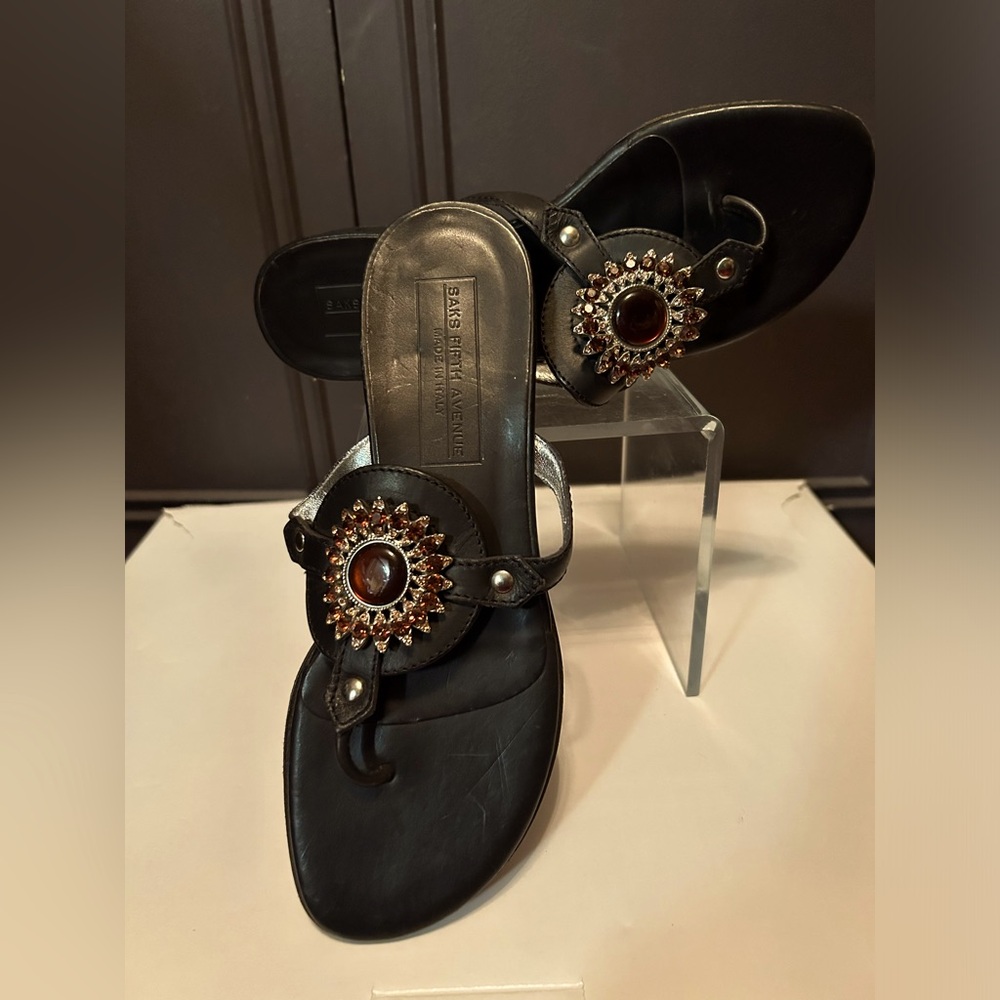 Saks Fifth Avenue leather Sandals with embellish center. New originally $275.00